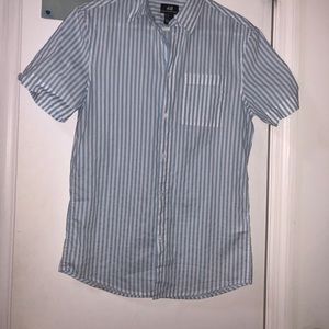 Blue and white striped buttoned up shirt